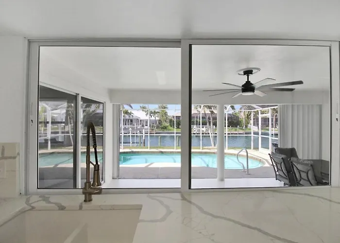 Chic & Modern Canal-Front Retreat With Private Pool - Azure Tides